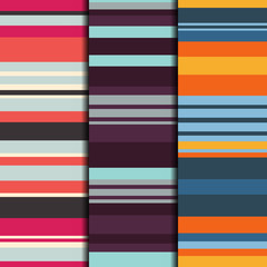 Set of 3 seamless patterns striped design. Retro textile prints with random colored stripes. Vector fashion backgrounds.