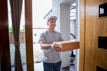 delivery man delivering box