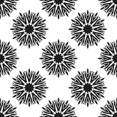 Seamless pattern with abstract flowers. Fashion textile print. Asian fabric background. Vector monochrome design. Perforation floral holes.