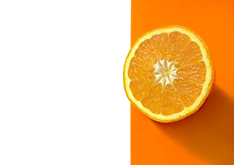 half an orange on a white background