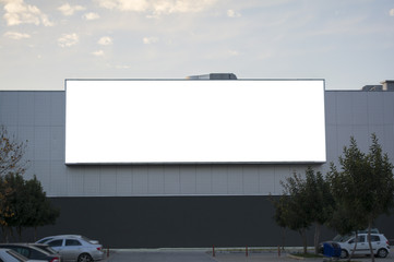 blank billboard in a city with building background