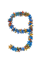 Number 9 made of puzzle pieces