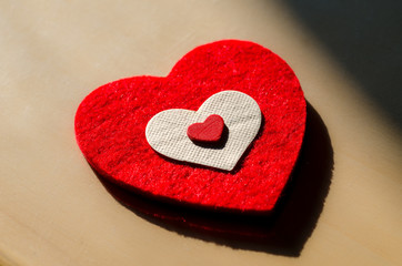 valentine's day, a big heart and more hearts together, to tell you I love you. falling in love has its symbol with the heart. heart of fabric feeling of softness, cuddles and deep affection. love, web