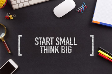 START SMALL THINK BIG CONCEPT ON BLACKBOARD