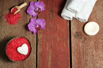 Spa still life on St. Valentine's Day in red and white with orchid flowers, top view, copy space for your text