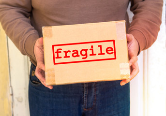 fragile on cardboard box