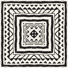 Seamless ethnic and tribal pattern. Hand drawn ornamental stripes. Black and white print. Vector geometric background.