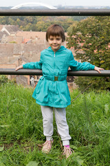 The girl poses on the Petrovaradin fortress
