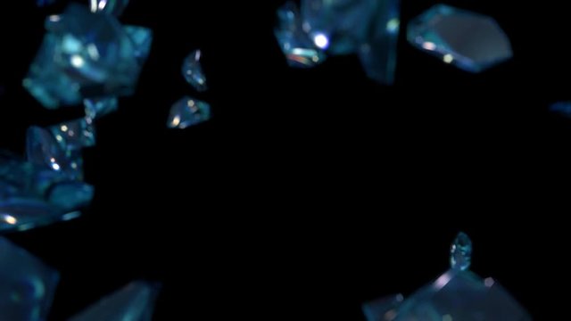 Animated broken glass on a black background. The fragments slowly fly and rotate.