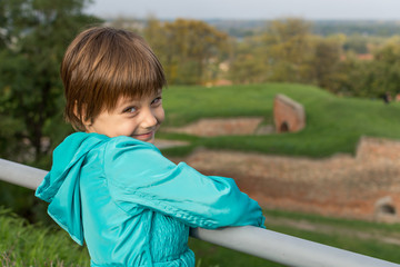 The girl poses on the Petrovaradin fortress