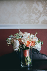 stylish beautiful bridal bouquet from different flowers