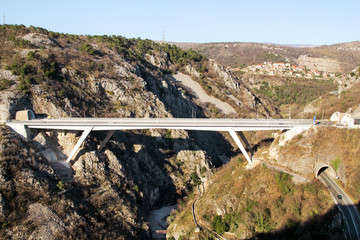 Fototapeta premium Scenic view on motorway tunnel and bridge highway road leading through in Croatia, Europe / Transport and traffic infrastructure / Signs and signaling.