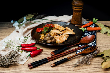 wok fried chicken stir fry with sweet peppers and chinese vegetables