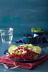 spiralized beet and cucumber salad with avocado dressing, healthy vegan meal