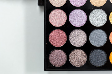 Backgrounds of Cosmetic makeup set on table.