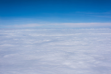 Beautiful blue sky and white could wallpaper background from air plane window