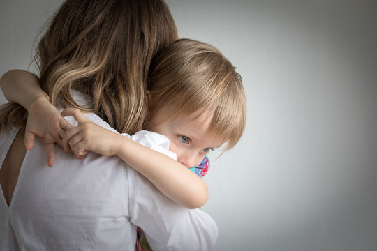 Little Boy Hug And Loves Mom. Family Background.