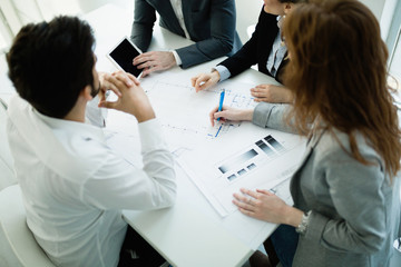 Fototapeta premium Portrait of architects having discussion in office