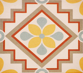 Detail of the traditional tiles from facade of old house. Decorative tiles.Valencian traditional tiles. Floral ornament.
