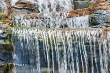 Fast moving flowing water, series of waterfalls