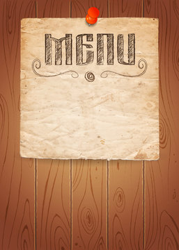 Menu of restaurant on old paper and wooden background