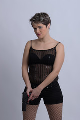 Woman  standing with gun