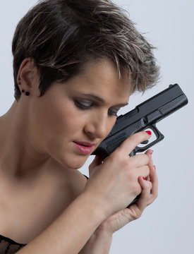 Female portrait with gun