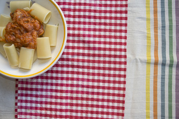 paccheri pasta with tomato sauce and onion