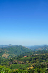Fototapeta na wymiar Nature view mountain, forest and blue sky