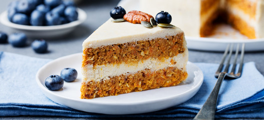 Vegan, raw carrot cake on a white plate. Healthy food. - 191513834