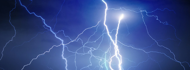 Thunder, lightnings and rain during summer storm.