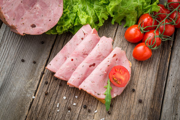 sandwich with ham and vegetables