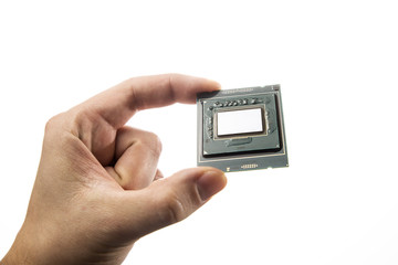 Clean CPU's PCB. No thermal paste in man's hand isolated on white background.