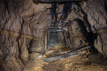 Underground abandoned ore mine shaft tunnel gallery