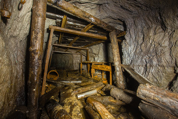 Fototapeta na wymiar Underground abandoned ore mine shaft tunnel gallery