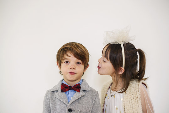 Portrait of a girl looking at a boy