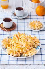 Pineapple ringlets in puff pastry, baked in the form of flowers