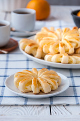 Pineapple ringlets in puff pastry, baked in the form of flowers