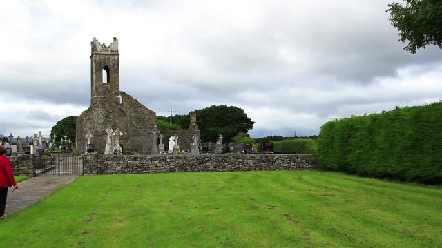 Old Irish Celtic Church Ruins in Ireland with Grass Field