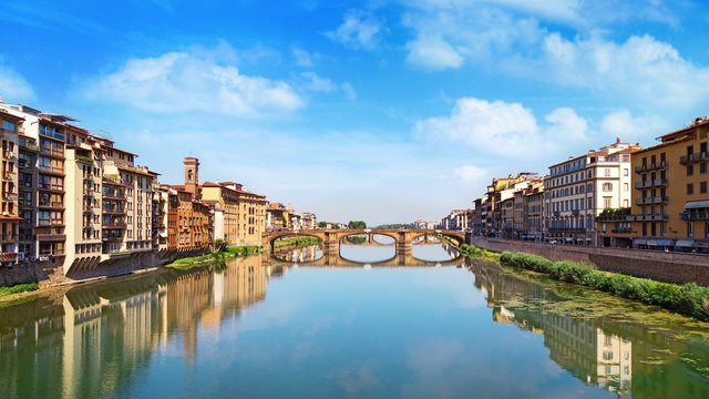 Famous landmark of Florence is the Bridge Trinity. Renaissance bridge over river Arno. Italy, June 2017. Ponte Santa Trinita.