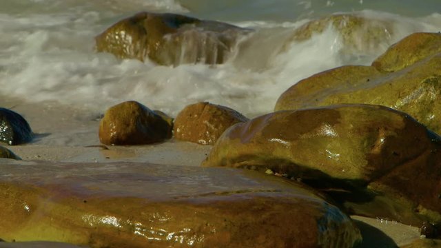 Seashore close up - gentle waves and rocks - Simonstown