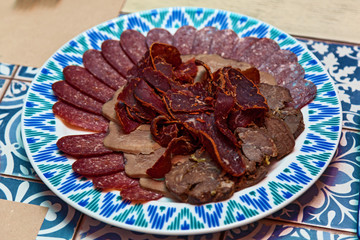 snacks from basturma, various kinds of meat and kalbasy for a buffet table. Appetizer from basturma
