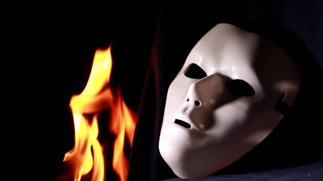 Close up of a white mystique mask 
