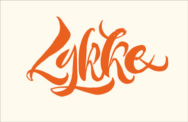 Lykke lettering. It is a Danish happiness concept. Hand drawn calligraphy inscription. Brush pen modern text