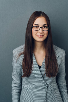 Studio portrait of a young woman wearing glasses