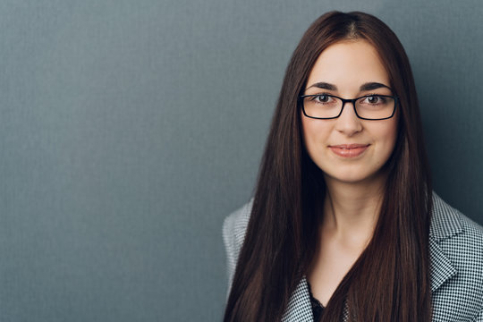 Stylish young professional woman with glasses