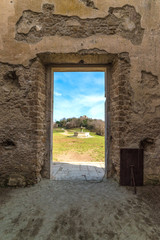 Fototapeta premium Monterano (Italy) - A ghost medieval town in the country of Lazio region, located in the province of Rome, perched on the summit plateau of the hill tuff.