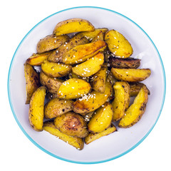 Baked potatoes in peel, cut into slices