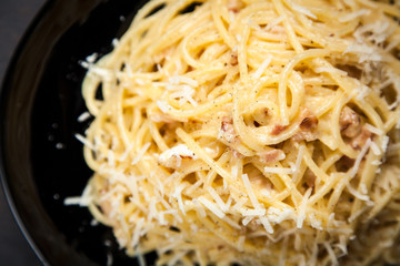 Spaghetti carbonara with egg and pancetta