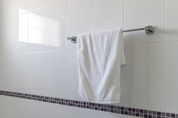 white towel in a bathroom